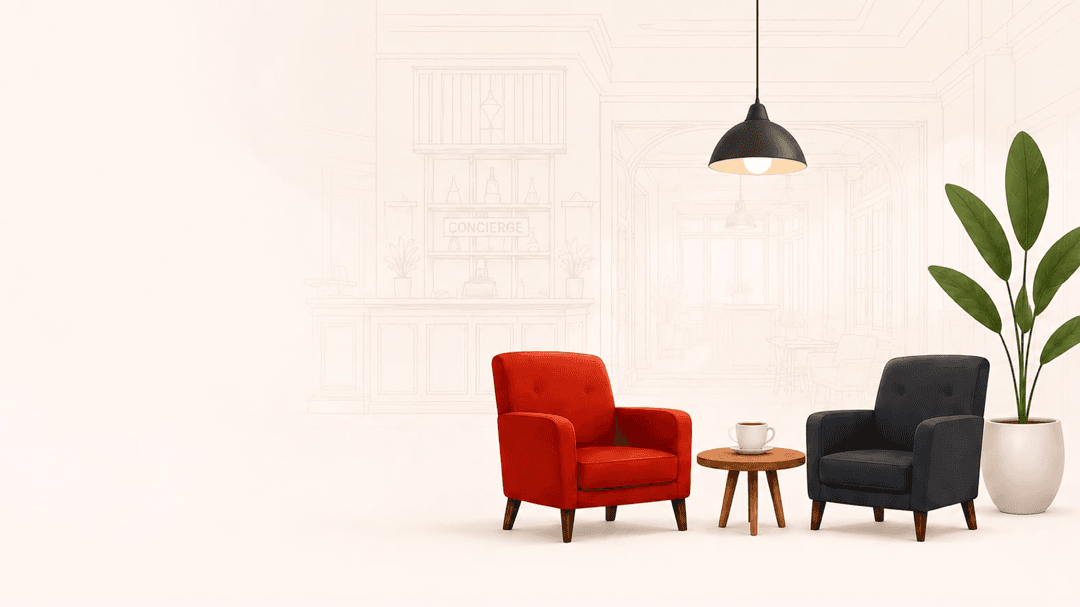 Hotel lobby with red and dark armchairs, a pendant light and a plant